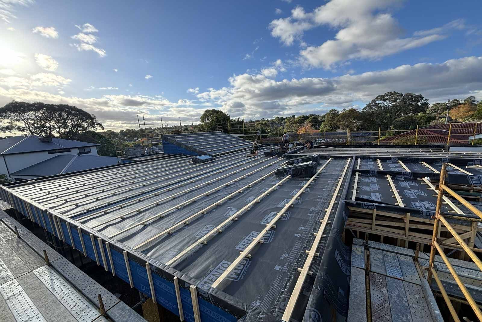 Roof under construction with membrane laid before the roofing goes on