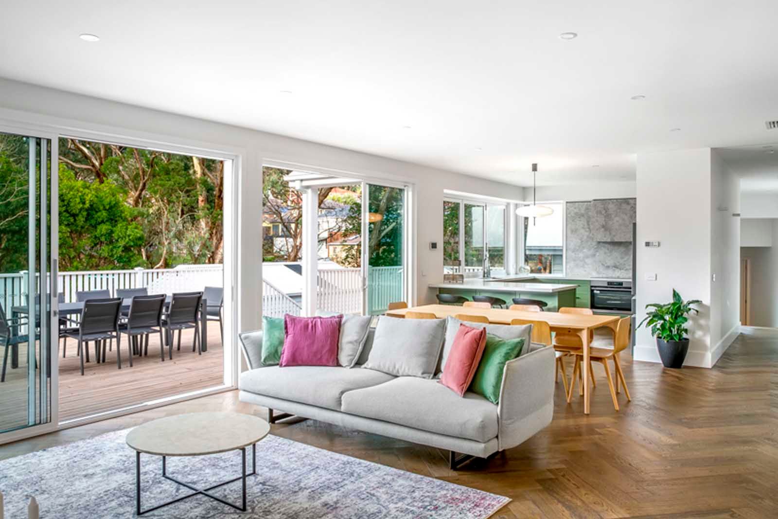 Open-plan living opening to the deck
