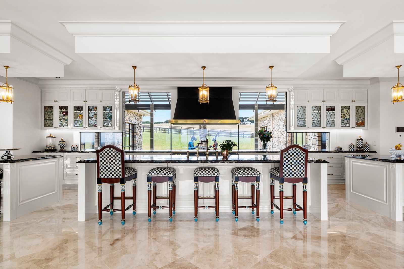 Kitchen with island seating and paddock views