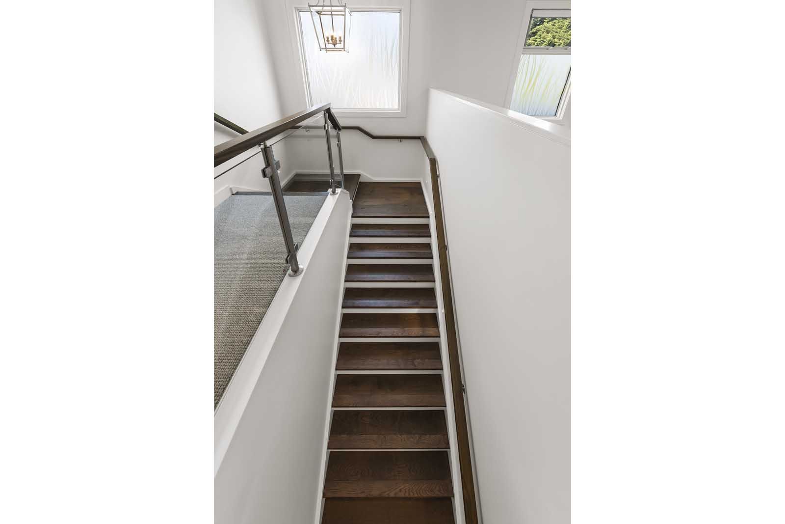 Timber staircase lit from above