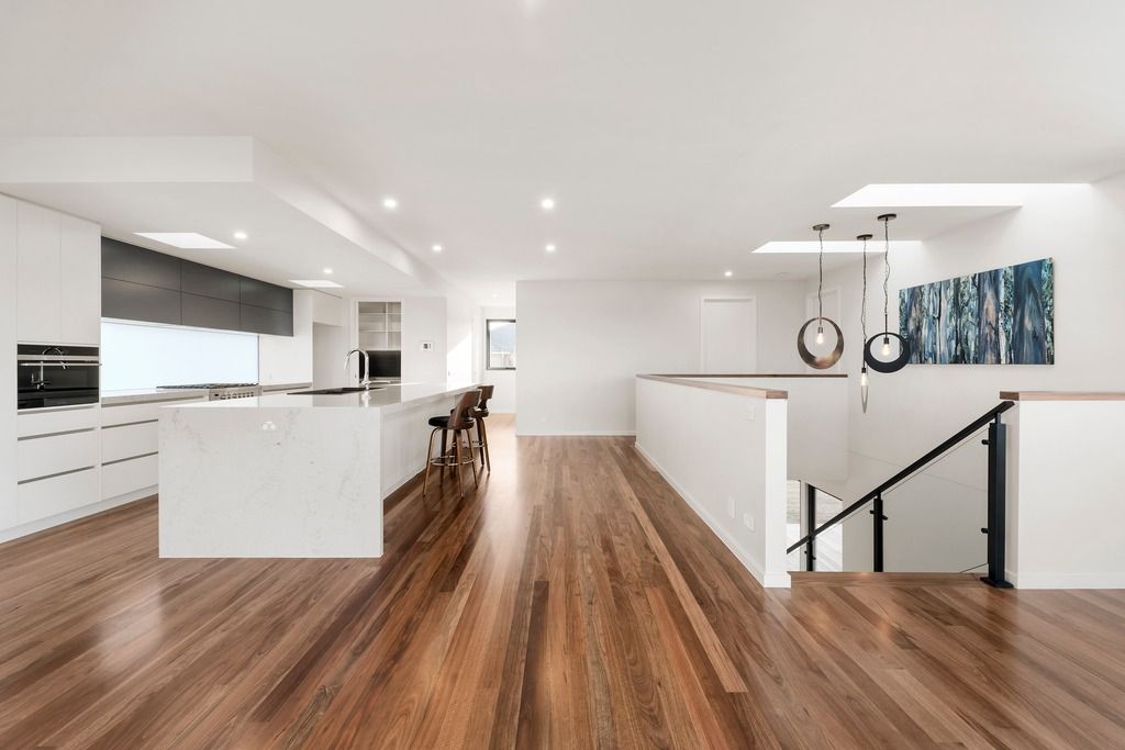 Open-plan kitchen and living with timber floors