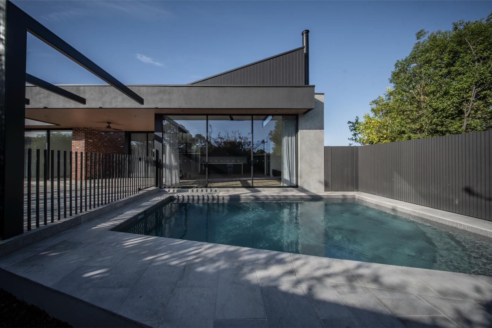 In-ground pool beside the alfresco