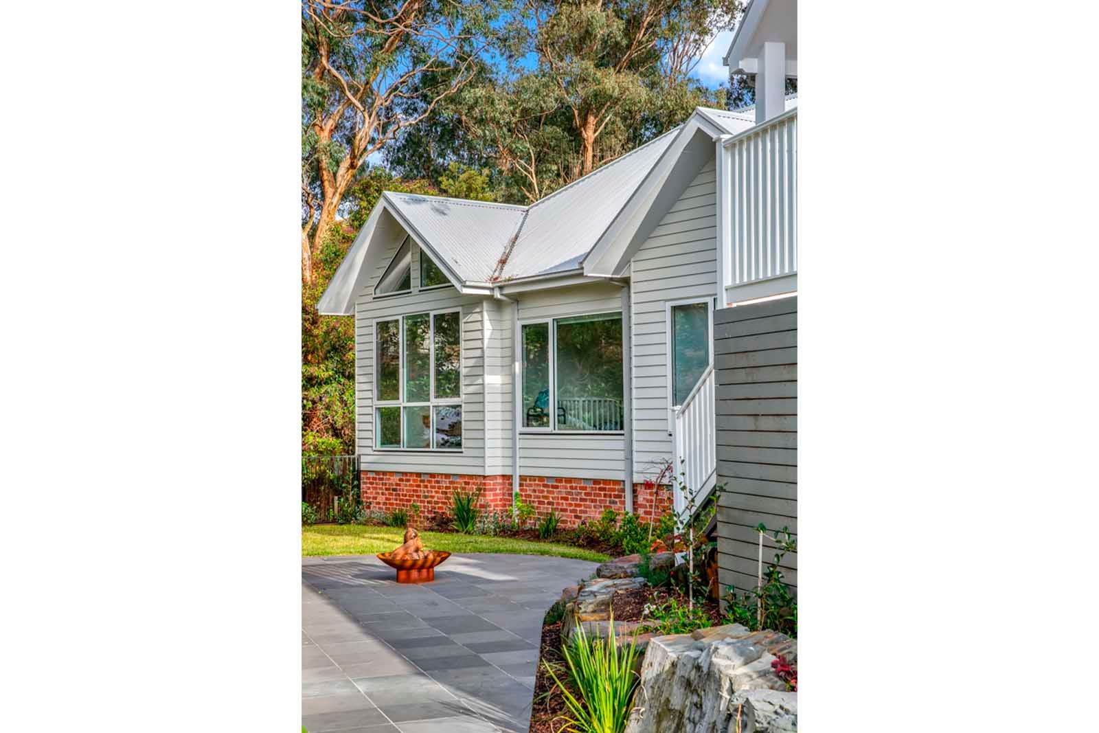 Front of the home with garden steps