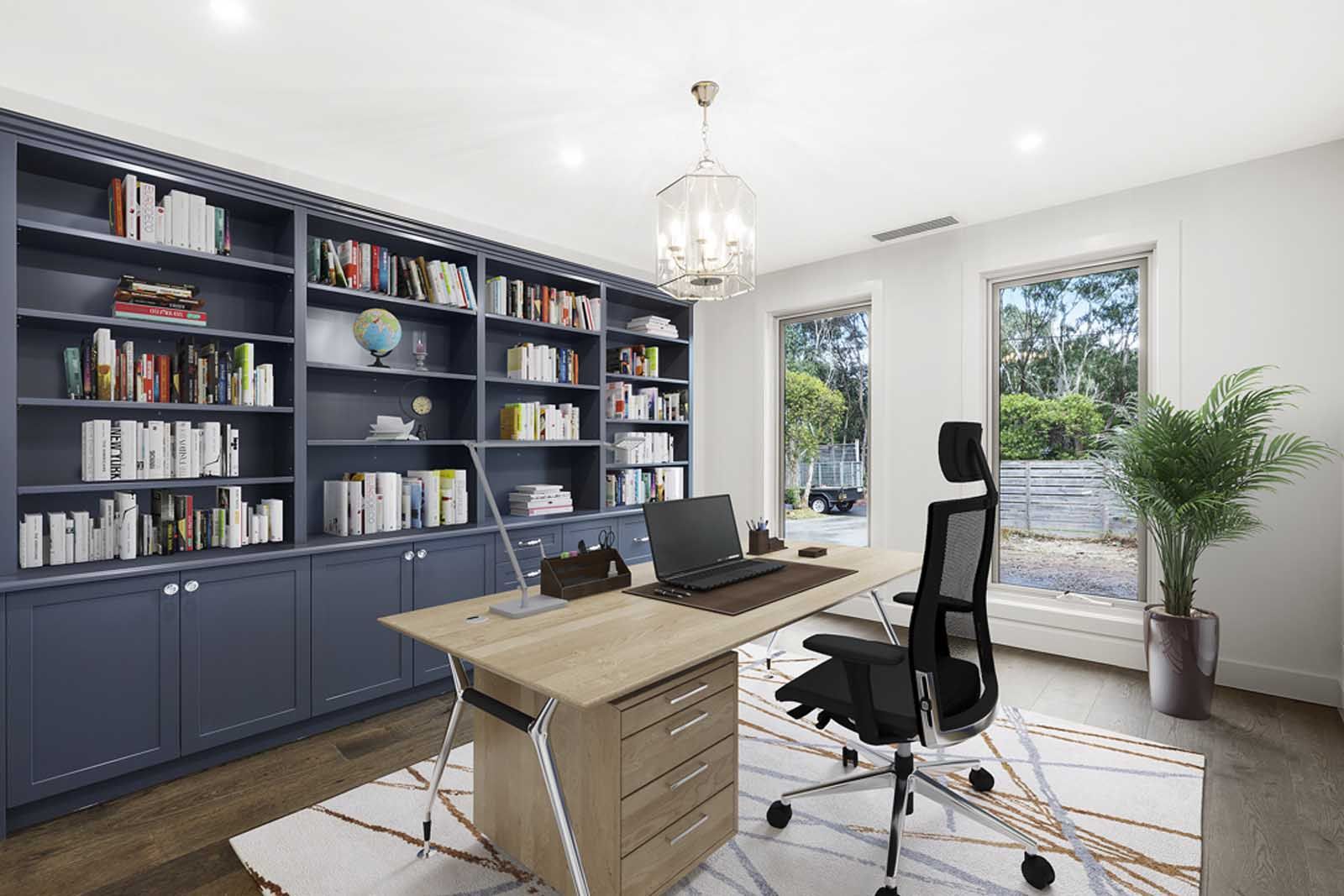 Study with built-in navy bookshelves