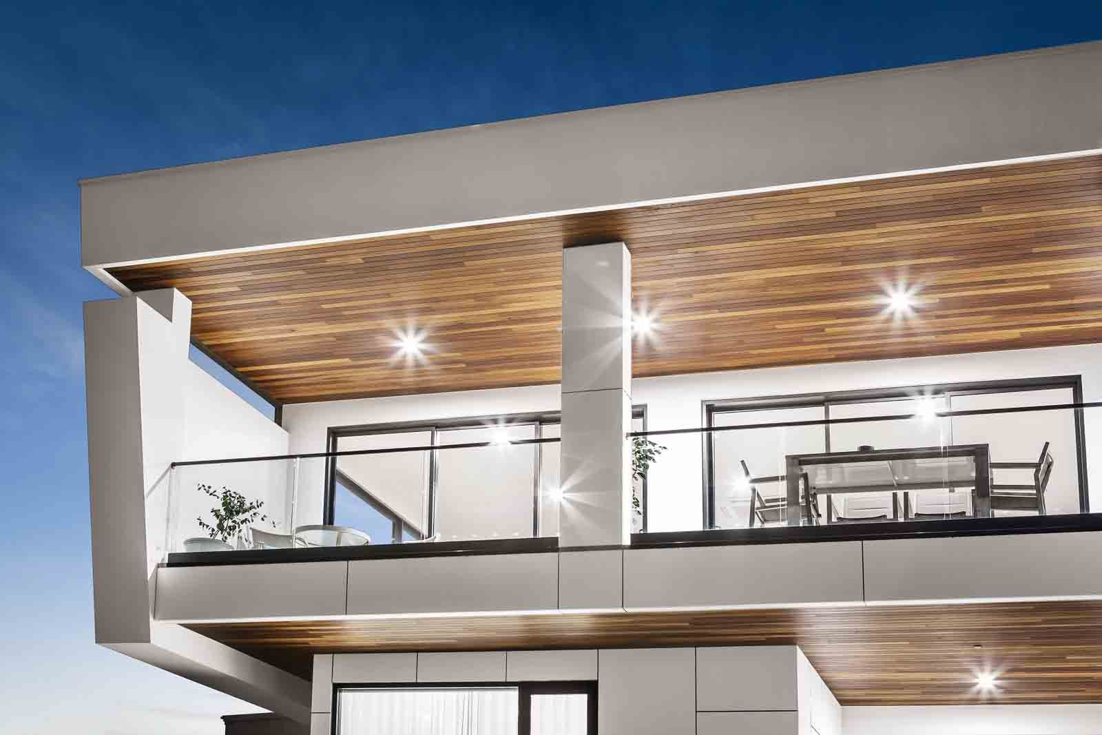 Balcony with timber-lined soffit and glass balustrade