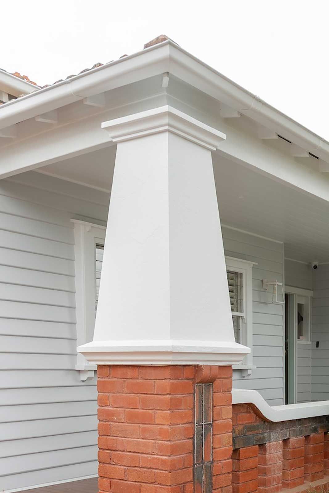 Restored period verandah post and weatherboards at the front of the home
